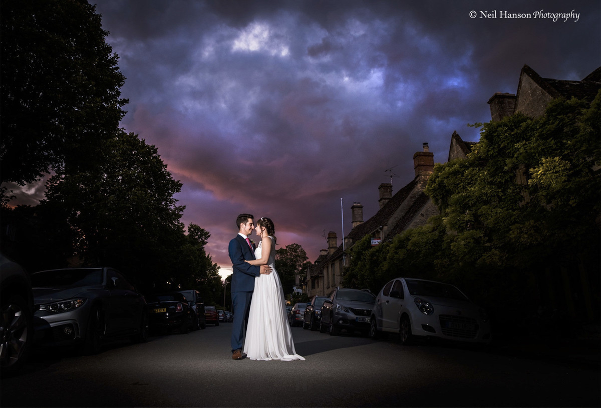 Bride and Groom at sunset on their wedding day at The Bay Tree Hotel Burford