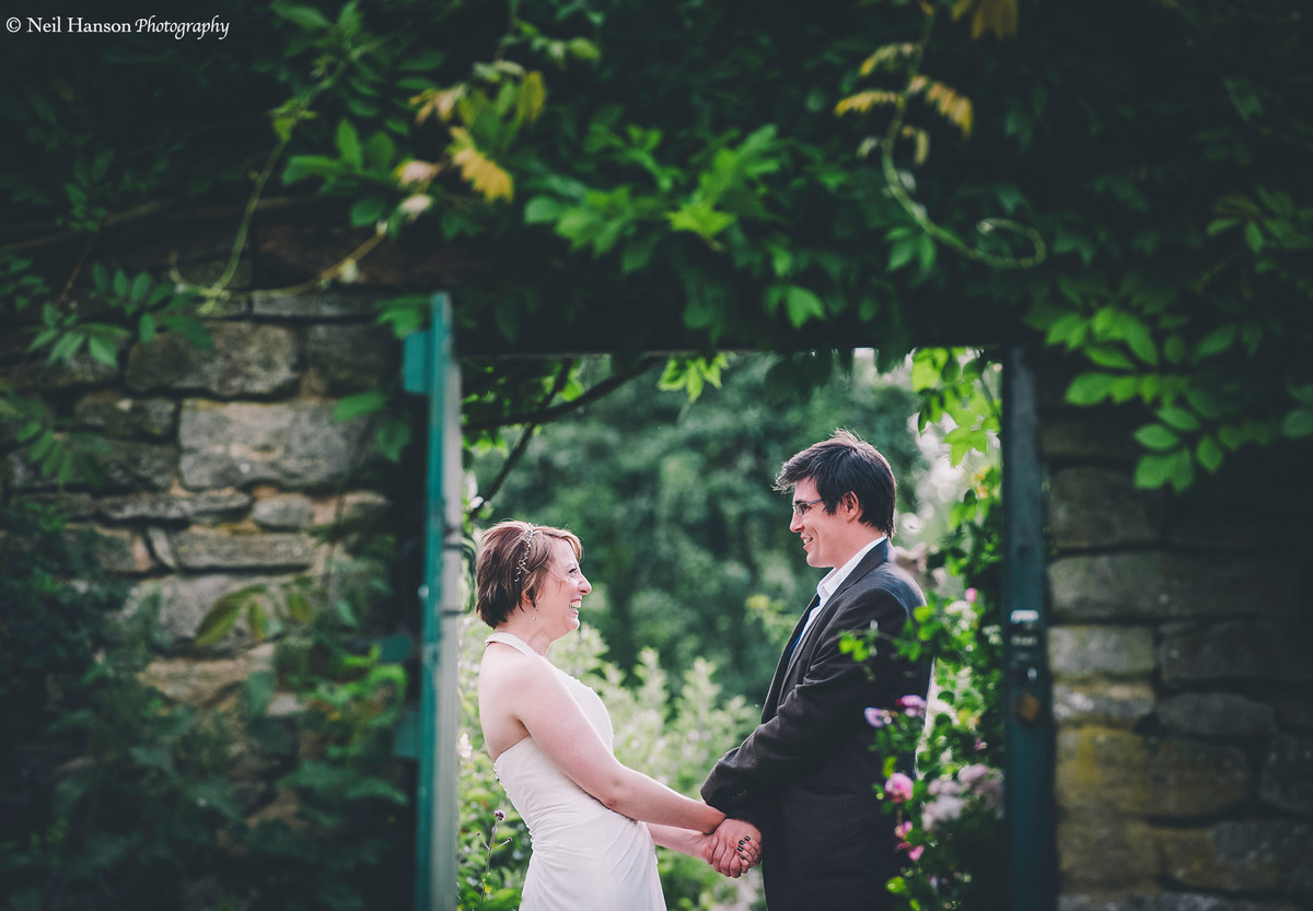 Bride and Groom on their wedding day at Cogges Manor farm